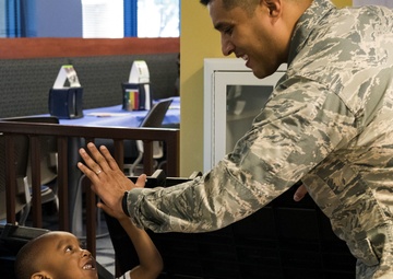 Families come together during deployed spouse dinner