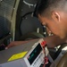 U.S. Marines perform maintenance on the AN-FPN-63(V) radar