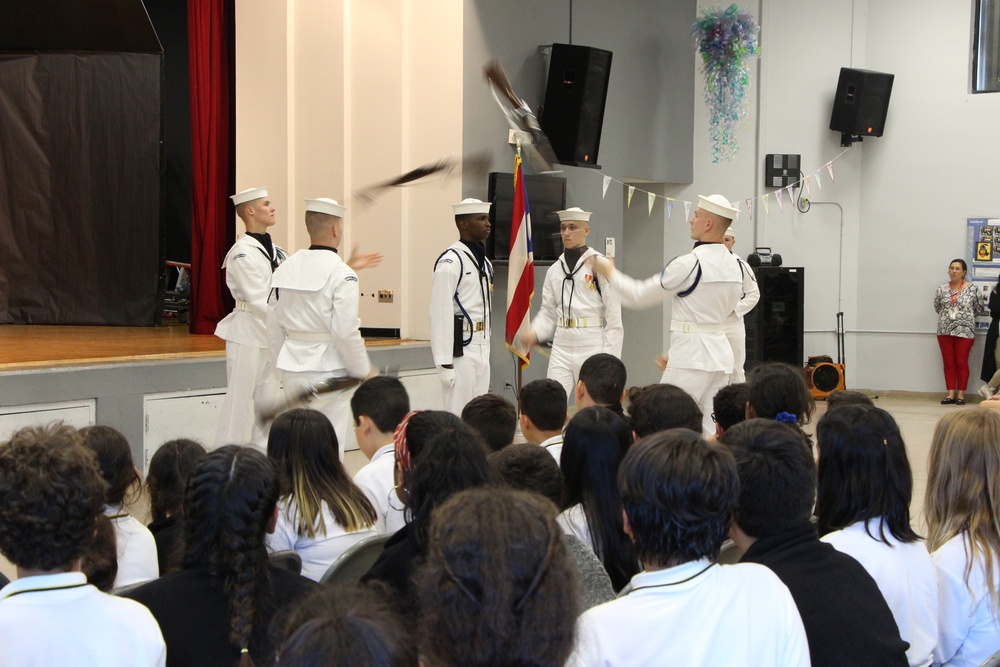 Members of the U.S. Navy Drill Team perform for students from Antilles Middle School on Fort Buchanan as a part of Navy Week Puerto Rico.