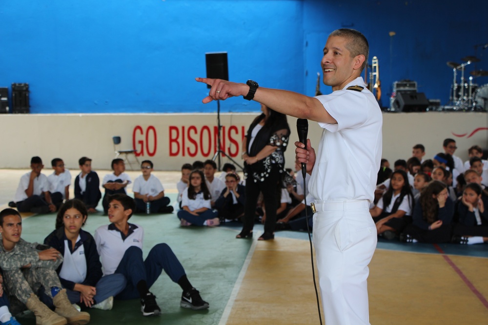 Cmdr. Ravi Desai, commanding officer of the USS San Juan (SSN 571), answers questions from students at the American Military Academy in Bayamón as a part of Navy Week Puerto Rico.