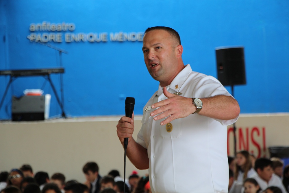 Command Master Chief Gary Stephenson, chief of the boat of the USS San Juan (SSN 571), answers questions from students at the American Military Academy in Bayamón as a part of Navy Week Puerto Rico.