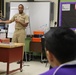 Lt. Karlton Mitchell talks to students about his career at Antilles High School on Fort Buchanan as a part of Navy Week Puerto Rico.