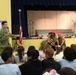 Lieutenant Junior Grade Tim Loret from Explosive Ordnance Group 2 answers questions from students from Antilles Middle School on Fort Buchanan as a part of Navy Week Puerto Rico.