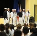 Members of the U.S. Navy Drill Team answer questions for students from Antilles Middle School on Fort Buchanan as a part of Navy Week Puerto Rico.