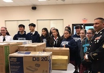 Building partnerships in Djibouti”; Deployed Texas Guardsman inspires Laredo school donations, delivers 500 sandals to barefooted orphans