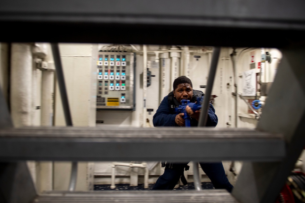 Preble Sailors Perform Maintenance And Practice Security.