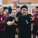 Sky Soldier attempts cornhole while wearing vision impairment goggles