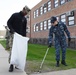 Sailors participate in a base clean-up