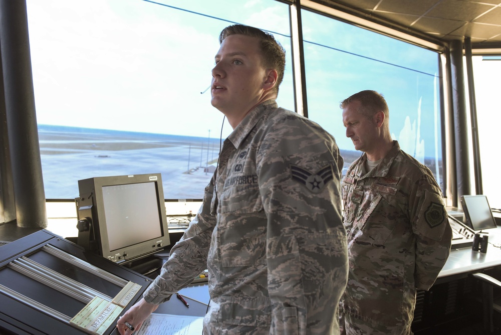 325th Fighter Wing Commander visits air traffic control specialist as part of Airman Shadow program