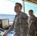 325th Fighter Wing Commander visits air traffic control specialist as part of Airman Shadow program