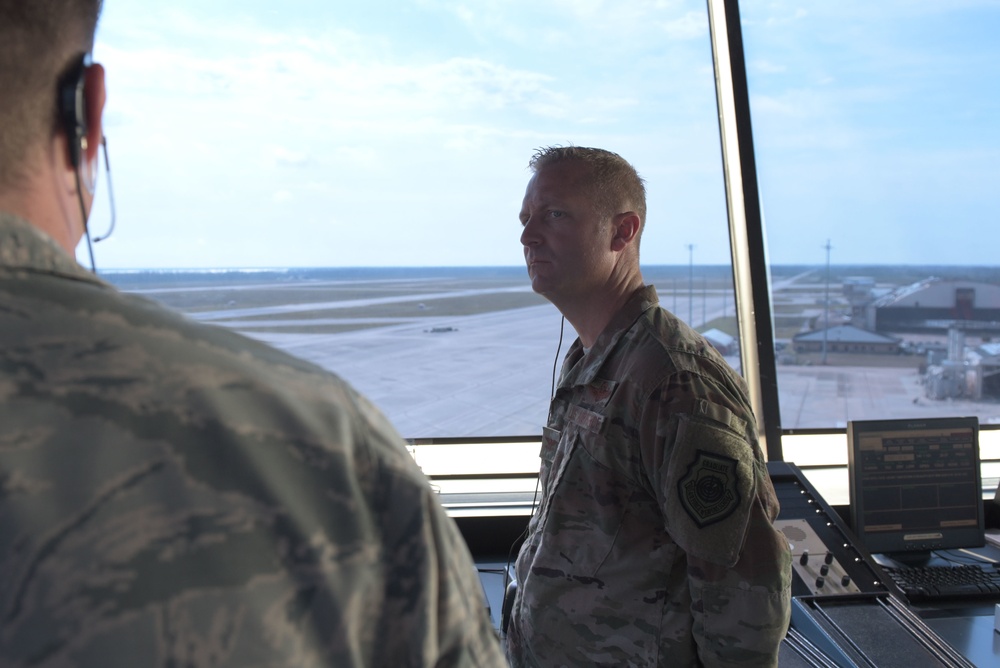 325th Fighter Wing Commander visits air traffic control specialist as part of Airman Shadow program