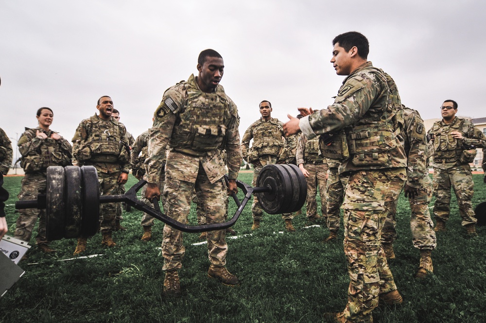 Teammate encourages fellow paratrooper