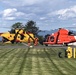 MH-65 Dolphin helicopter aircrew transfers patients to Royal Canadian aircrew