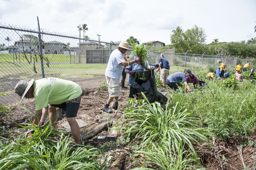 Volunteers restore ancient fishpond during Earth Month