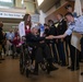 Military members and Victory Belles welcome veterans in New Orleans