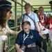 Military members and Victory Belles welcome veterans in New Orleans