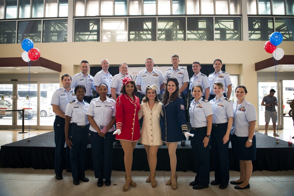 Military members and Victory Belles welcome veterans in New Orleans