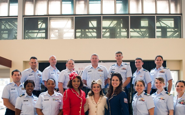 Military members and Victory Belles welcome veterans in New Orleans
