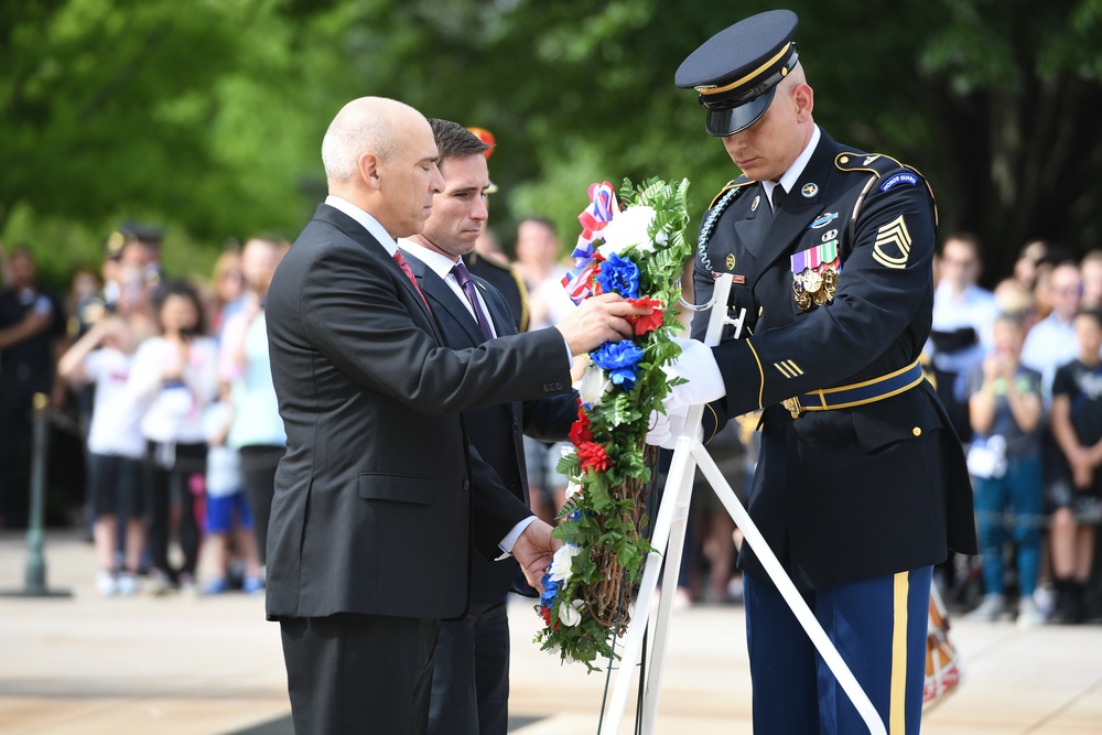 Dr. Hassan and Mr. Kinsella Laying a Wreath