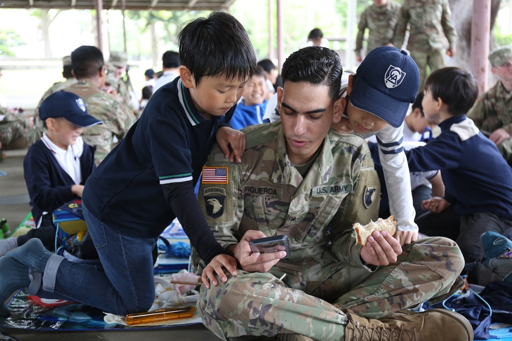 38th ADA Soldiers plant trees, friendship with Japanese students at Earth Day event