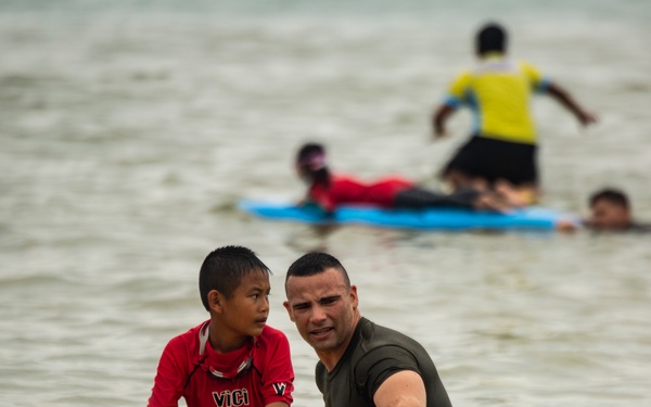 U.S. Marines participate in a swim survival COMREL event