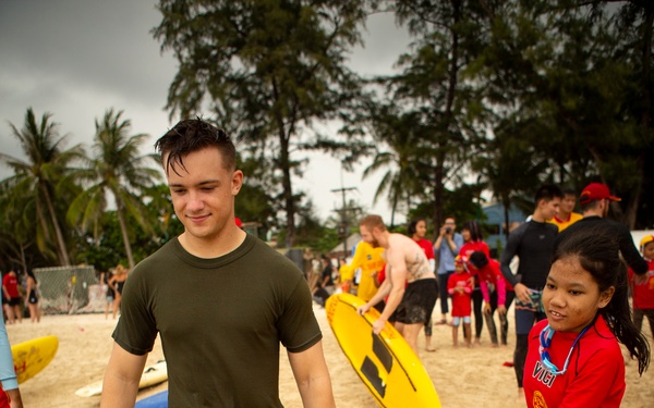 U.S. Marines participate in a swim survival COMREL event