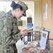 NSA Souda Bay Sailors Receive Greek Easter Bread