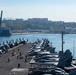 The aircraft carrier USS John C. Stennis (CVN 74) pulls out of Marseille, France