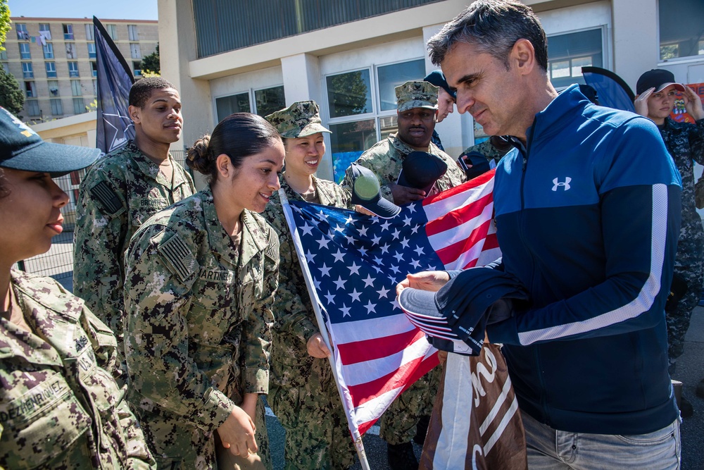 U.S. Sailors assigned to the John C. Stennis Carrier Strike Group (JCSCSG) volunteer at the Saint-Louis Primary School