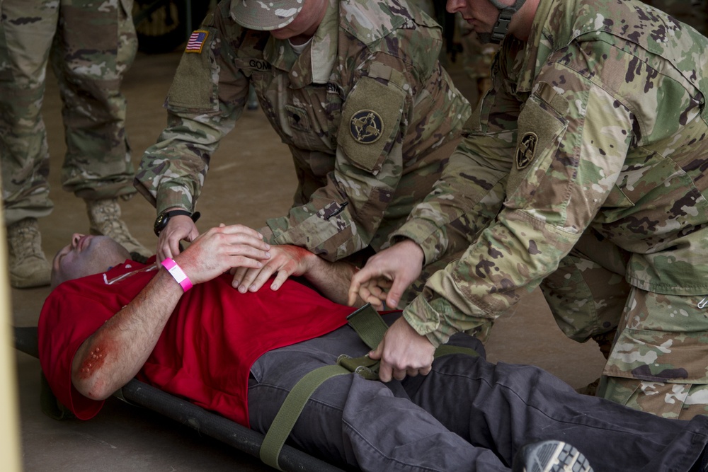 Service members conduct moulage training for Guardian Response 2019