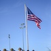 Soldiers raise flag for youth baseball