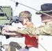 Soldiers raise flag at youth baseball