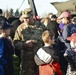 Soldiers raise flag for youth baseball game