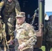 Soldiers raise flag for youth baseball game