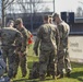 Soldiers raise flag for youth baseball