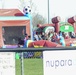 Soldiers raise flag at youth baseball game