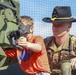Soldiers raise flag at youth baseball game
