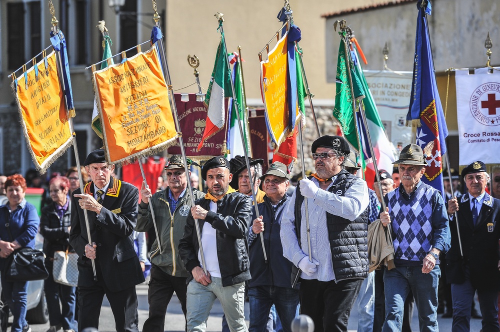 Locals hoist flags