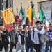 Locals hoist flags