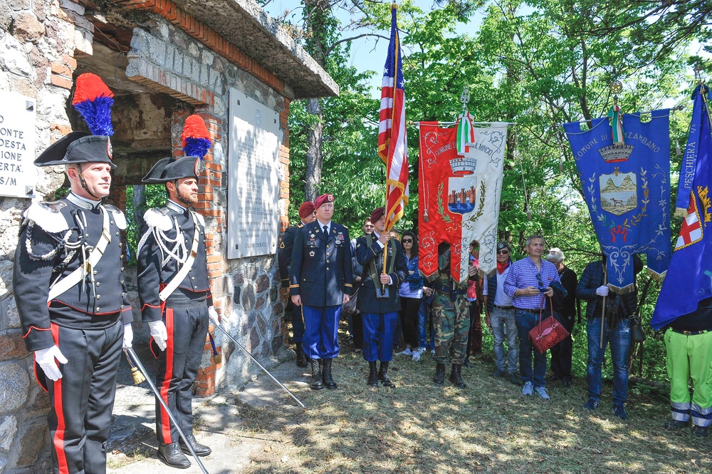 Paratroopers stand at memorial