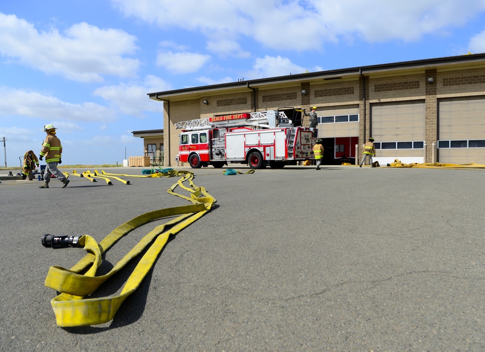 9th CES fire fighters test, certify firehoses