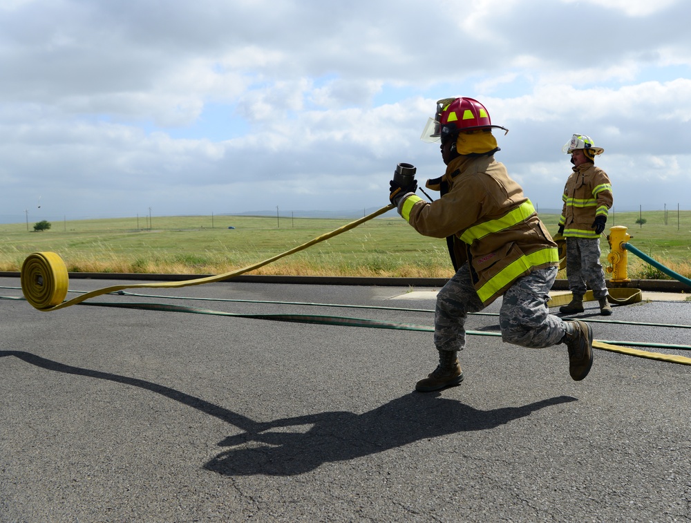 9th CES fire fighters test, certify firehoses
