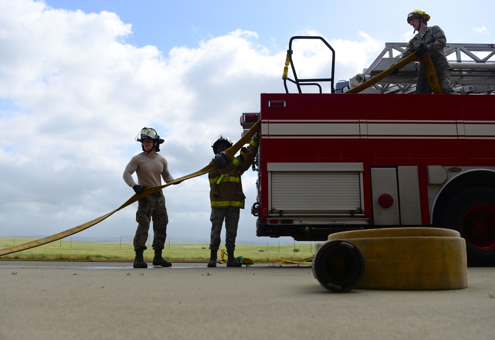 9th CES fire fighters test, certify firehoses