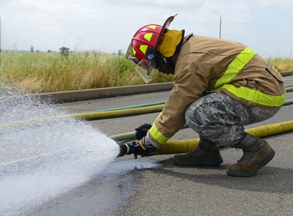 9th CES fire fighters test, certify firehoses