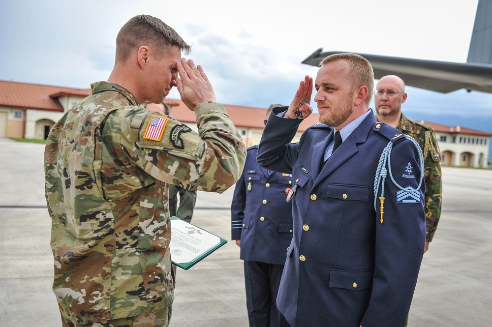 Soldiers exchange salutes