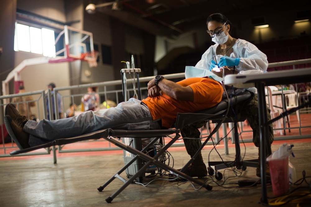 U.S. service members perform medical care at Innovative Readiness Training Puerto Rico 2019
