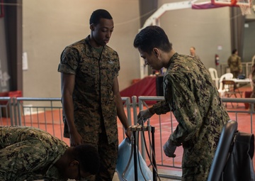 Petty Officer 2nd Class Ryan Pyne, a hospital corpsman with Marine Forces Reserve at Innovative Readiness Training 2019 Puerto Rico