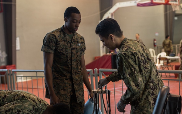 Petty Officer 2nd Class Ryan Pyne, a hospital corpsman with Marine Forces Reserve at Innovative Readiness Training 2019 Puerto Rico