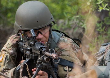 South Carolina Army National Guard officer candidates conduct squad movements during OCS