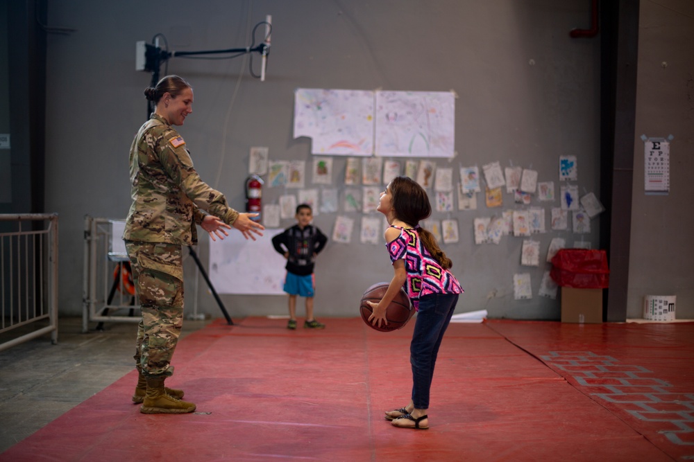 Children receive medical care, play with service members at IRT Puerto Rico 2019